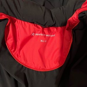 Red/white Perfect moment ski jacket.